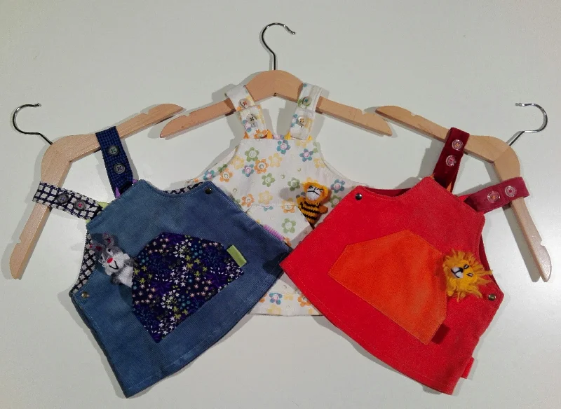 Dress with braces in corduroy